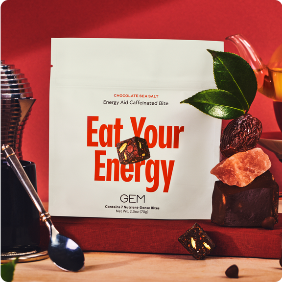 A GEM Energy Bite package with the Bite near it and ingredients found in it all surrounded by a red background